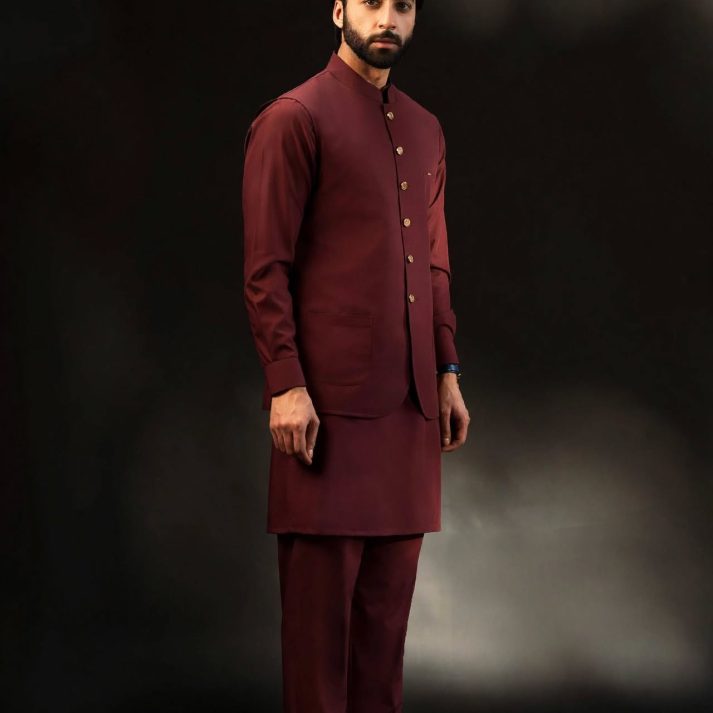 Maroon shalwar kameez and waistcoat